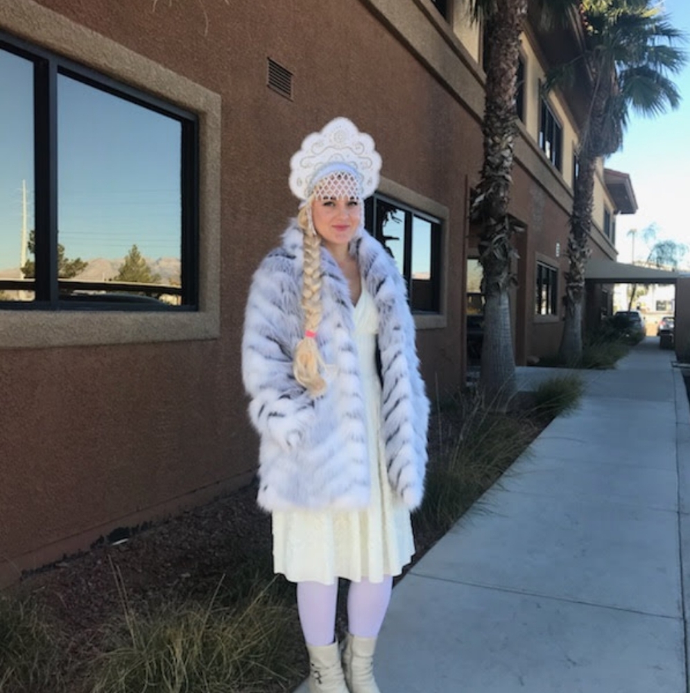 White faux fur coat